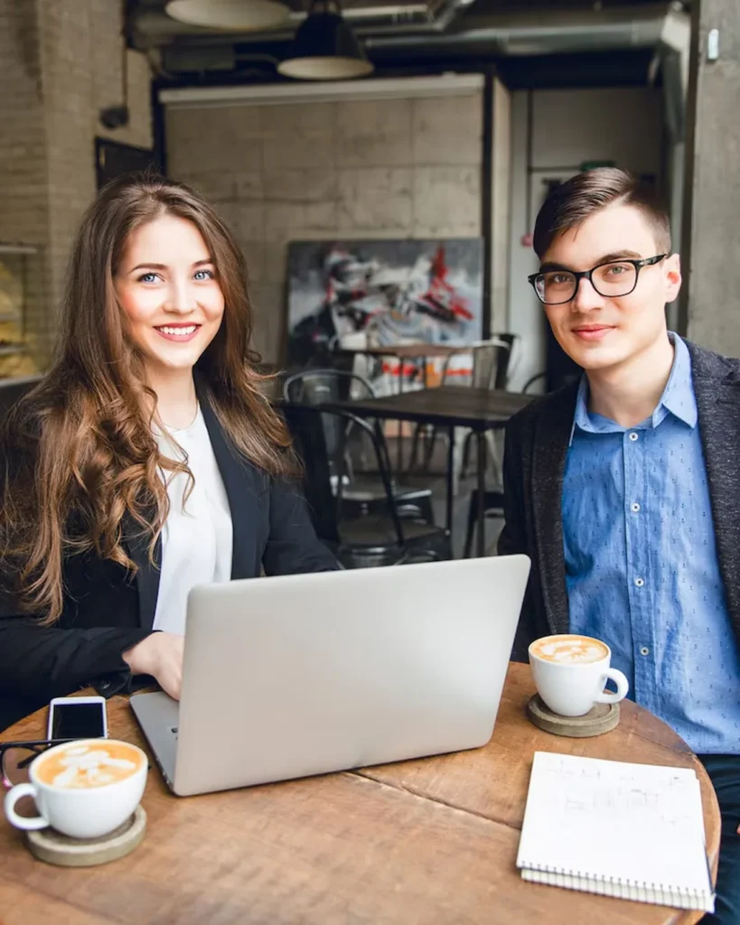 Two business partners meeting at a coffee shop