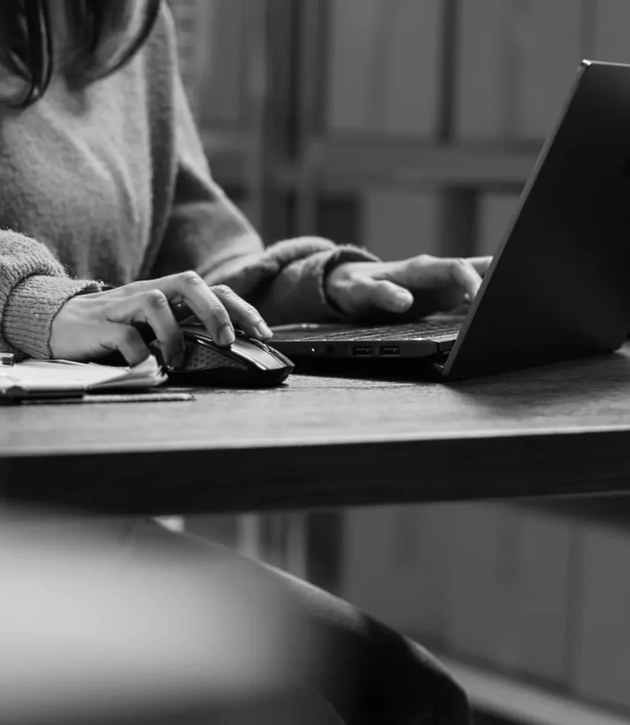 Business owner working at a laptop